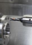 229 Сборное спиральное сверло Sandvik Coromant со сменной режущей твердосплавной головкой крупным планом на красочной иллюстрации каталога режущего и Каталог SANDVIK COROMANT 2017 Фрезы Сверла Расточные инструменты со сменными режущими пластинами Оснастка и принадлежности для станков Стр. J51