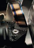 731 Фотография резца с режущей сменной пластиной из твердого сплава Процесс чернового точения на многофункциональном токарно-фрезерном центре с ЧПУ Руководство SANDVIK COROMANT 2010 по металлообработке Точение Фрезерование Сверление Растачивание Оснастка Стр. 